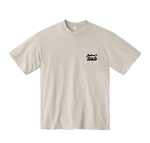 Cement colored t-shirt with a logo on the chest pocket 